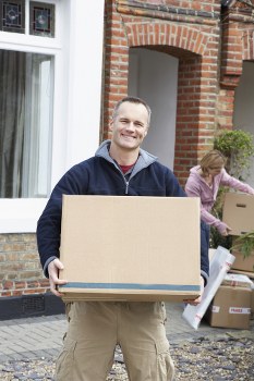 Furniture and boxes being loaded for an Acton move