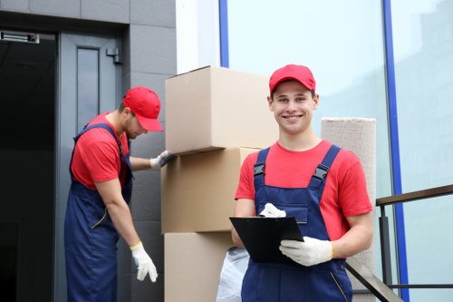 Removal team preparing a home move in Acton