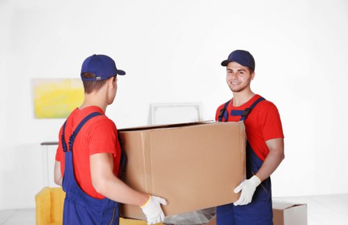 Removal team preparing a residential move in Acton