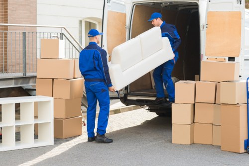 Flat removal service in Acton with boxes and furniture