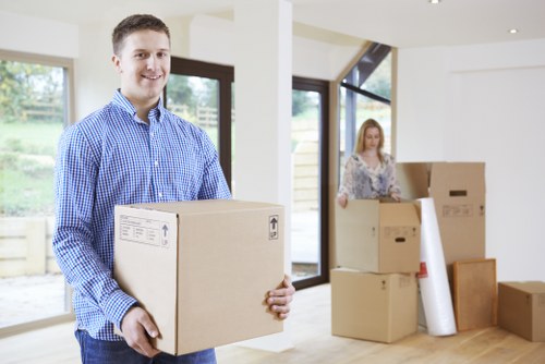 Professional movers assisting with a flat relocation in Acton