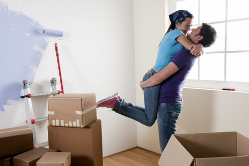 Office relocation with furniture dismantling and careful transport in Acton