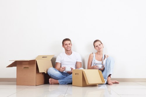 Boxes and household items prepared for a move in Acton
