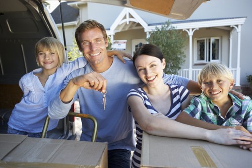 Professional man and van service handling a property move in Acton