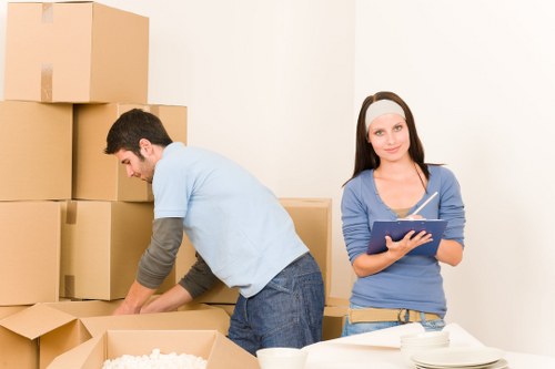 Packing and labeling items for a West London business relocation