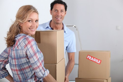 Furniture and boxes prepared for a removals job in Acton