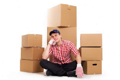 Packed boxes and furniture prepared for a house removal in Acton